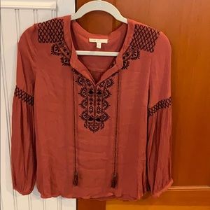 Pale burnt red tunic